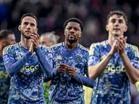 AFC Ajax Amsterdam midfielder Branco van den Boomen and AFC Ajax Amsterdam forward Chuba Akpom participate in the match between Twente and A...