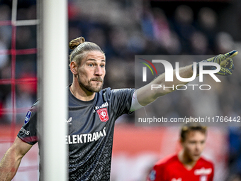 FC Twente goalkeeper Lars Unnerstall plays during the match between Twente and Ajax at the Grolsch Veste stadium for the Dutch Eredivisie se...