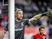 FC Twente goalkeeper Lars Unnerstall plays during the match between Twente and Ajax at the Grolsch Veste stadium for the Dutch Eredivisie se...