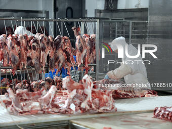 Workers divide beef at a workshop of a beef processing enterprise in Binzhou, China, on November 11, 2024. Global food prices rise in Octobe...