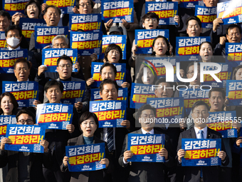 Democratic Party Floor Leader Park Chan-dae (center) and other Democratic Party lawmakers chant slogans during the launch ceremony of the 10...