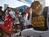 Members of the Cargo Truckers Solidarity Division of the Korean Public Service and Transport Workers' Union under the Korean Confederation o...