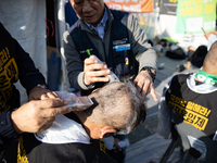 Members of the Cargo Truckers Solidarity Division of the Korean Public Service and Transport Workers' Union under the Korean Confederation o...