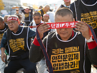 Members of the Cargo Truckers Solidarity Division of the Korean Public Service and Transport Workers' Union under the Korean Confederation o...