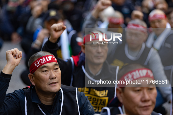 Members of the Cargo Truckers Solidarity Division of the Korean Public Service and Transport Workers' Union under the Korean Confederation o...