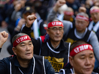 Members of the Cargo Truckers Solidarity Division of the Korean Public Service and Transport Workers' Union under the Korean Confederation o...