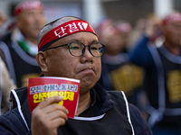 Members of the Cargo Truckers Solidarity Division of the Korean Public Service and Transport Workers' Union under the Korean Confederation o...