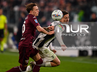 Marcus Pedersen of Torino battles for the ball with Kenan Yildiz of Juventus during the Serie A match between Juventus and Torino FC at Alli...