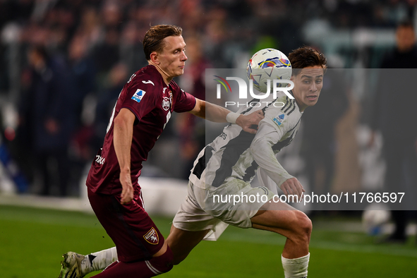 Marcus Pedersen of Torino battles for the ball with Kenan Yildiz of Juventus during the Serie A match between Juventus and Torino FC at Alli...