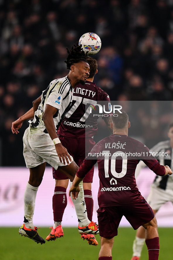 Khephren Thuram of Juventus battles for the ball with Karol Linetty of Torino during the Serie A match between Juventus and Torino FC at All...