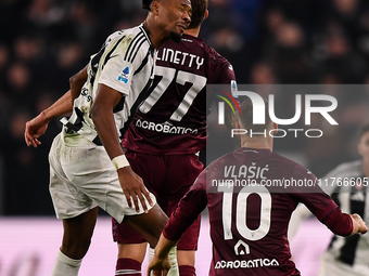 Khephren Thuram of Juventus battles for the ball with Karol Linetty of Torino during the Serie A match between Juventus and Torino FC at All...