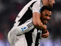 Juventus' Federico Gatti celebrates with Juventus' Danilo at the end of the Serie A match between Juventus and Torino FC at Allianz Stadium...