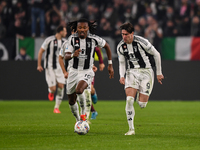 Khephren Thuram and Dusan Vlahovic of Juventus participate in the Serie A match between Juventus and Torino FC at Allianz Stadium in Turin,...