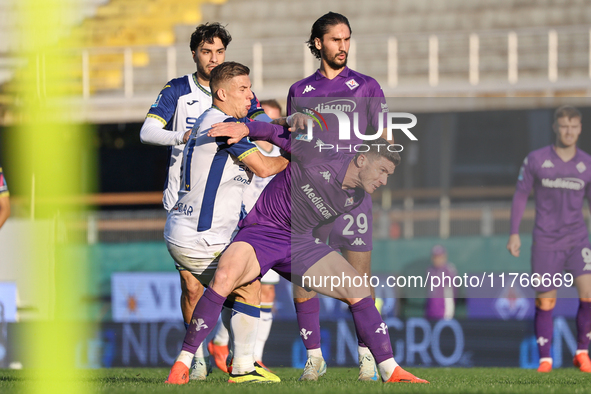 Yacine Adli and Robin Gosens participate in the Italian Serie A football match between Fiorentina and Hellas Verona at the Artemio Franchi S...