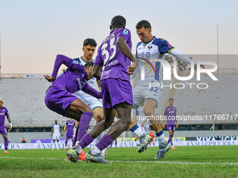 Christian Kouame controls the ball during the Italian Serie A football match between Fiorentina and Hellas Verona in Florence, Italy, on Nov...