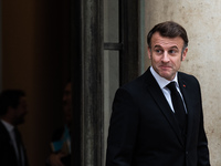 French President Emmanuel Macron receives British Prime Minister Keri Starmer at the Elysee Palace during celebrations marking the 106th ann...