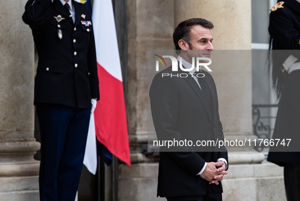 French President Emmanuel Macron receives British Prime Minister Keri Starmer at the Elysee Palace during celebrations marking the 106th ann...