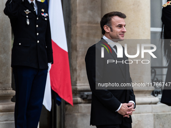 French President Emmanuel Macron receives British Prime Minister Keri Starmer at the Elysee Palace during celebrations marking the 106th ann...