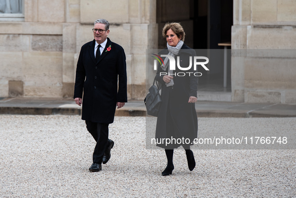 French President Emmanuel Macron receives British Prime Minister Keri Starmer at the Elysee Palace during celebrations marking the 106th ann...