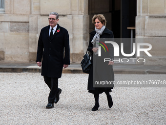 French President Emmanuel Macron receives British Prime Minister Keri Starmer at the Elysee Palace during celebrations marking the 106th ann...