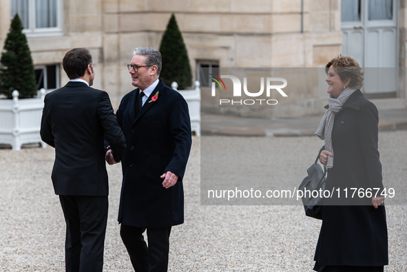 French President Emmanuel Macron receives British Prime Minister Keri Starmer at the Elysee Palace during celebrations marking the 106th ann...