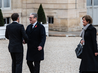 French President Emmanuel Macron receives British Prime Minister Keri Starmer at the Elysee Palace during celebrations marking the 106th ann...