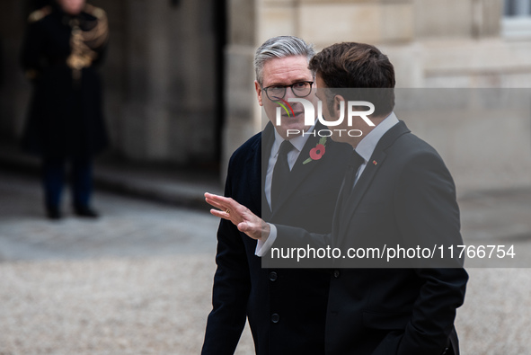 French President Emmanuel Macron receives British Prime Minister Keri Starmer at the Elysee Palace during celebrations marking the 106th ann...