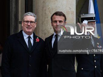 French President Emmanuel Macron receives British Prime Minister Keri Starmer at the Elysee Palace during celebrations marking the 106th ann...