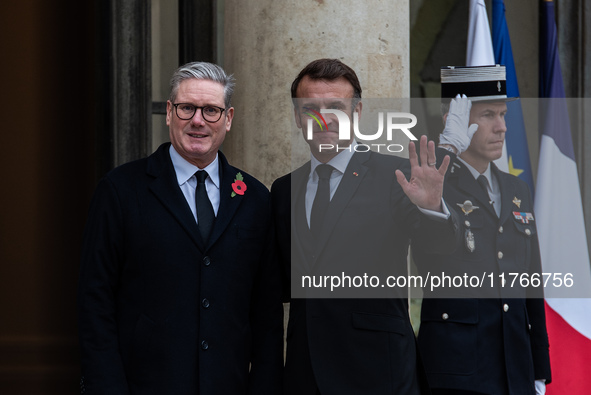 French President Emmanuel Macron receives British Prime Minister Keri Starmer at the Elysee Palace during celebrations marking the 106th ann...