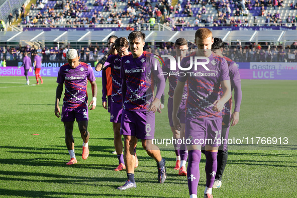 ACF Fiorentina players warm up before the match between the Italian Serie A football match between ACF Fiorentina and Hellas Verona FC ,on N...