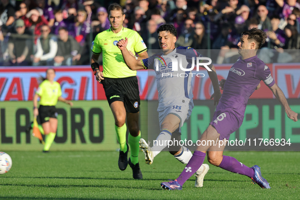 Luca Ranieri of ACF Fiorentina and Abdou Harroui of Hellas Verona FC ,battle for the ball during the Italian Serie A football match between...