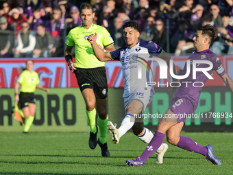 Luca Ranieri of ACF Fiorentina and Abdou Harroui of Hellas Verona FC ,battle for the ball during the Italian Serie A football match between...