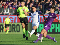 Luca Ranieri of ACF Fiorentina and Abdou Harroui of Hellas Verona FC ,battle for the ball during the Italian Serie A football match between...