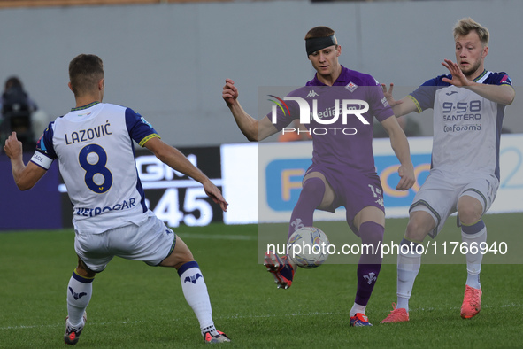 Pietro Comuzzo of ACF Fiorentina and Darko Lazovic of Hellas Verona FC ,battle for the ball during the Italian Serie A football match betwee...