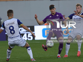 Pietro Comuzzo of ACF Fiorentina and Darko Lazovic of Hellas Verona FC ,battle for the ball during the Italian Serie A football match betwee...