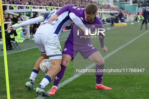 Lucas Beltran of ACF Fiorentina and Diego Coppola of Hellas Verona FC ,battle for the ball during the Italian Serie A football match between...