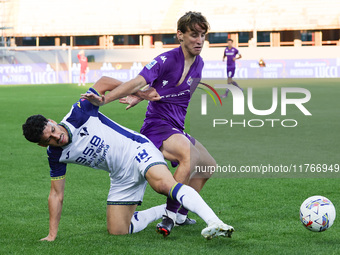 Edoardo Bove of ACF Fiorentina and Abdou Harroui of Hellas Verona FC ,battle for the ball during the Italian Serie A football match between...