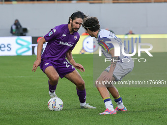 Yacine Adli of ACF Fiorentina and Domagoj Bradaric of Hellas Verona FC ,battle for the ball during the Italian Serie A football match betwee...