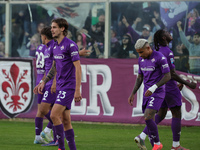 Moise Kean of ACF Fiorentina celebrates with teammates after scoring  goal under the curve of the Florentine fans during the Italian Serie A...