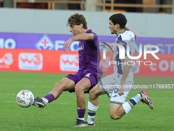 Edoardo Bove of ACF Fiorentina and Reda Belahyane of Hellas Verona FC ,battle for the ball during the Italian Serie A football match between...