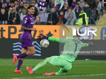 Andrea Colpani of ACF Fiorentina and Lorenzo Montipo of Hellas Verona FC ,battle for the ball during the Italian Serie A football match betw...