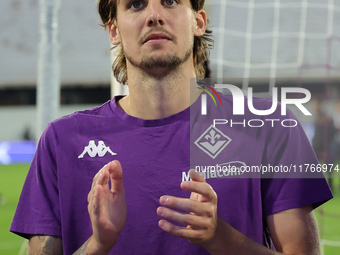 ACF Fiorentina players greet the curve of its fans after the victory between the Italian Serie A football match between ACF Fiorentina and H...