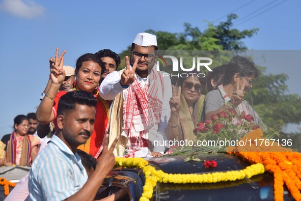 Congress candidate from the Samaguri constituency, Tanzil Hussain, participates in a roadshow during an election campaign rally ahead of the...