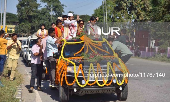 Congress candidate from the Samaguri constituency, Tanzil Hussain, participates in a roadshow during an election campaign rally ahead of the...