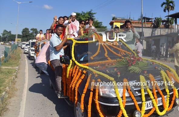 Congress candidate from the Samaguri constituency, Tanzil Hussain, participates in a roadshow during an election campaign rally ahead of the...