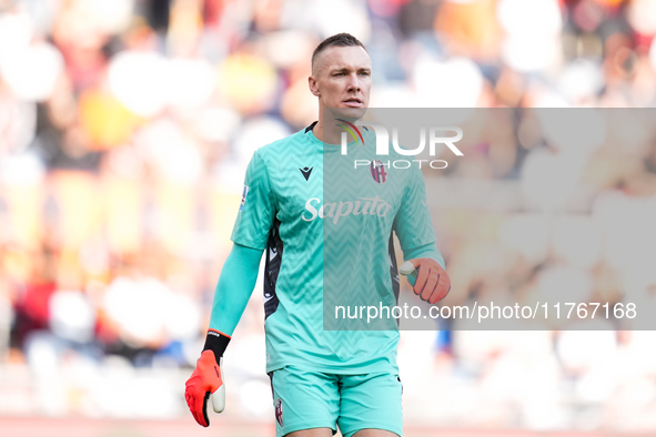 Lukasz Skorupski of Bologna FC looks on during the Serie A Enilive match between AS Roma and Bologna FC at Stadio Olimpico on November 10, 2...