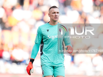 Lukasz Skorupski of Bologna FC looks on during the Serie A Enilive match between AS Roma and Bologna FC at Stadio Olimpico on November 10, 2...