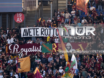 Supporters of AS Roma show a banner against the AS Roma society during the Serie A Enilive match between AS Roma and Bologna FC at Stadio Ol...