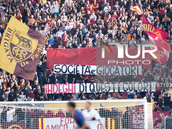 Supporters of AS Roma show a banner against society during the Serie A Enilive match between AS Roma and Bologna FC at Stadio Olimpico on No...