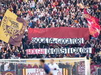 Supporters of AS Roma show a banner against society during the Serie A Enilive match between AS Roma and Bologna FC at Stadio Olimpico on No...